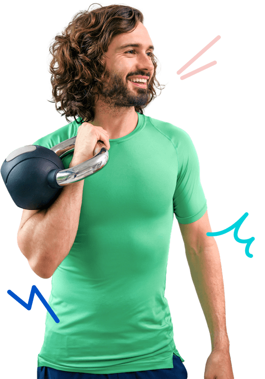 Joe Wicks holding a dumbbell